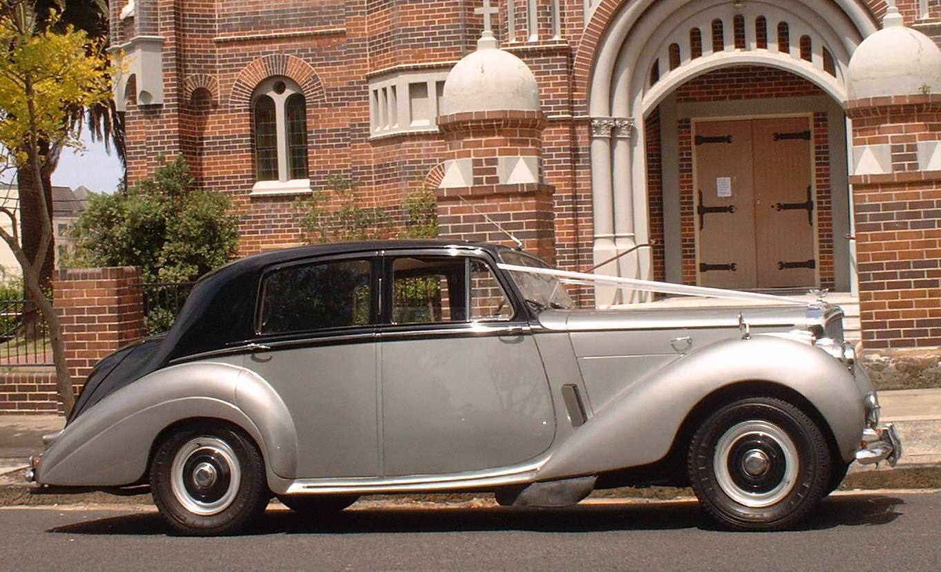 classic black and silver bentley wedding car for hire