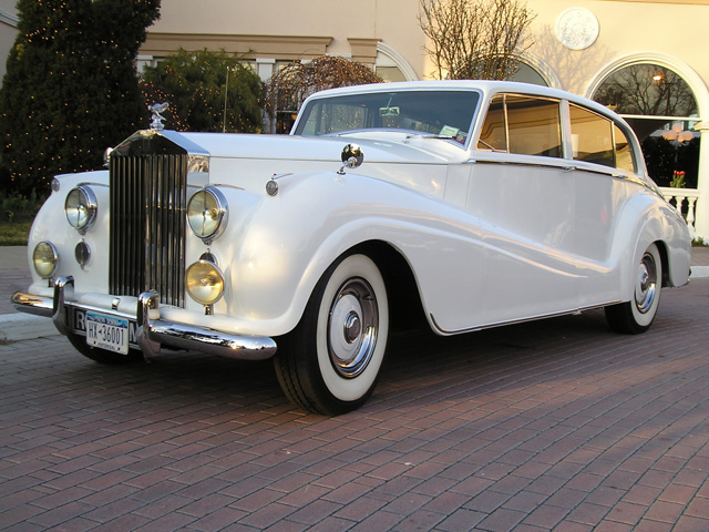 white vintage wedding car